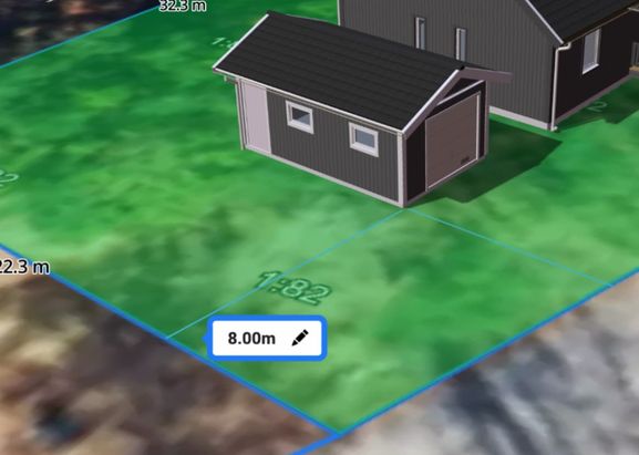 Grafik som visar avståndsmätning mellan en 3d-modell av ett garage och en tomtgräns