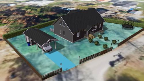 Grått 1,5-planshus med garage och omgivande tomt