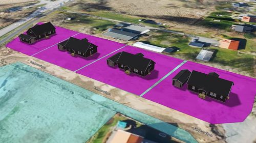 Fyra avstyckade tomter med nyckelfärdiga hus och garage